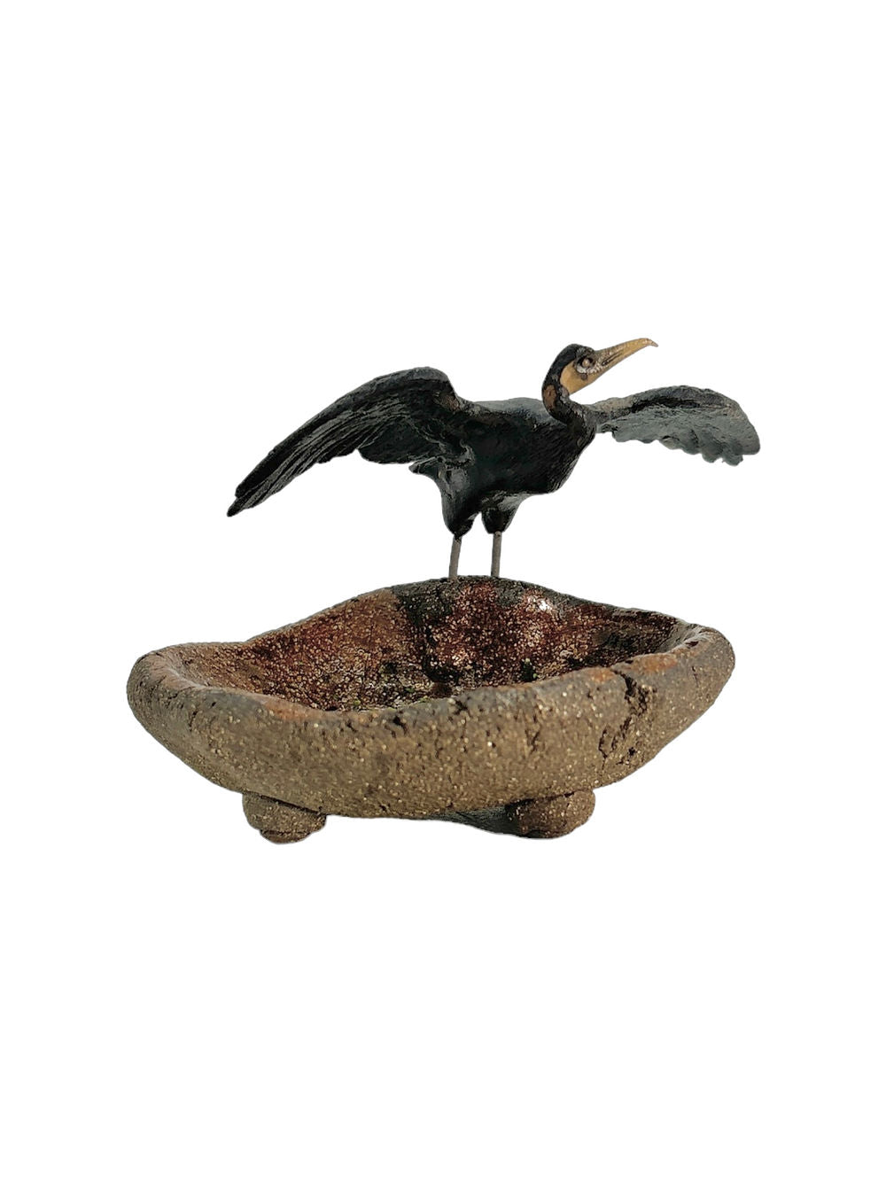 Figurine oiseau sur bassin