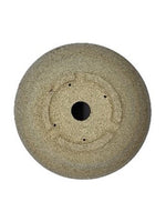Fond du céramique artisanale ronde 